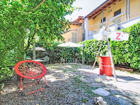 Furniture, Chair, Outdoor Furniture, Garden, Backyard, Yard, Shade, Outdoor Table, Lawn, Landscaping