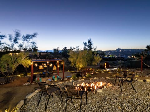 Fire pit - overlooking the outdoor patio and dining area. Stay warm!