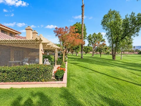 Enjoy al fresco meals and relaxing moments in this inviting outdoor space.