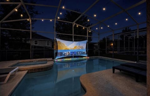 Unwind beneath a canopy of glowing lights in your own nighttime oasis. 
