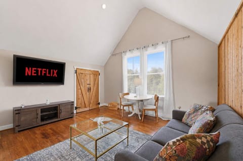 Living Room: Relax in a cozy living room with comfortable seating, warm natural light, and a welcoming layout perfect for unwinding, chatting, or enjoying a quiet night in.