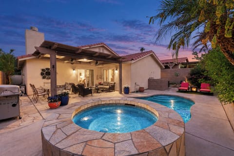 Twilight glow over your private pool and spa, the perfect way to end a desert day
