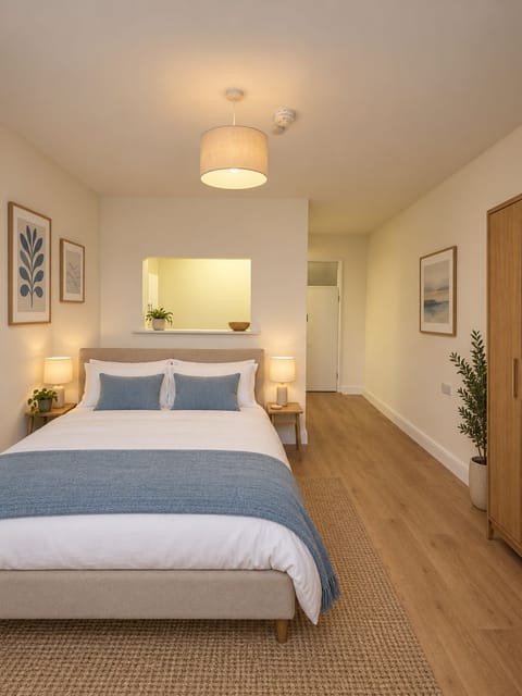 A comfortable bedroom featuring a double bed, perfect for a restful stay.