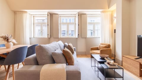 Unwind in the bright living area, where cozy seating meets a charming dining space for memorable meals and relaxation.
#LivingRoom #DiningArea #LovelyStay