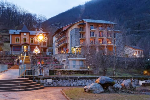 Home base for your Ax 3 Domaines ski week, lit up as the lifts close for the day.
