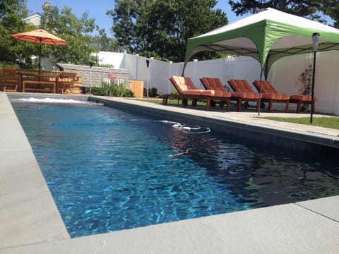 Heated 30'x9' pool with 6'x9' hot tub. Plantings have grown in since then!