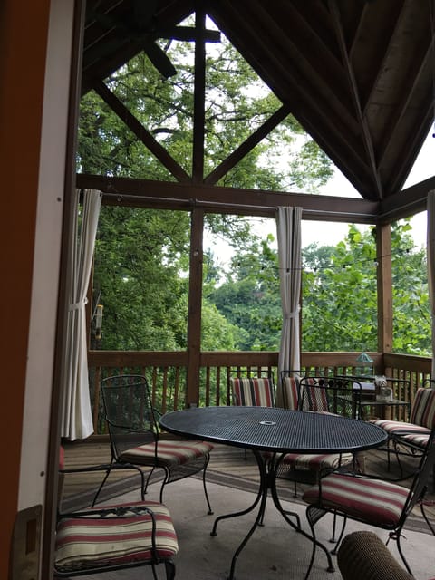 Morning coffee at the deck watching the birds and the river rolling down
