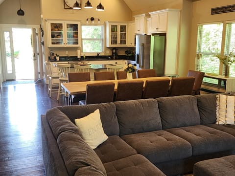 open concept dining, kitchen and living room