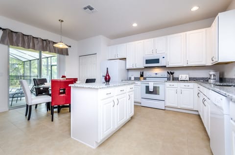 Open Plan Kitchen With Island and Breakfast Nook