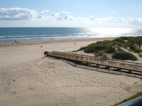 To get to the beach - go down to 1st floor, exit building & take this beach walk