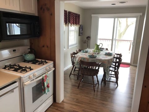 Kitchen looking to dining area with lake views