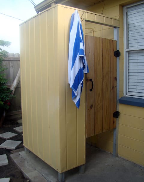 Wash off the beach sand in our handy outdoor shower with hot/cold plumbing.