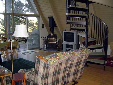 Living room with sit down view of lake.