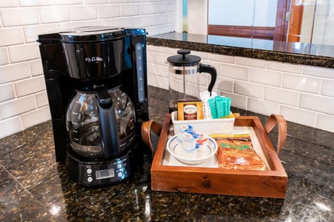 Start your Bourbon Trail day with our coffee station! Updated coffee maker to Keurig Duo. Also features a French press & a tray with teas & creamers.