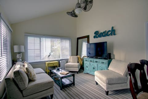 Open concept living room with views of the common area