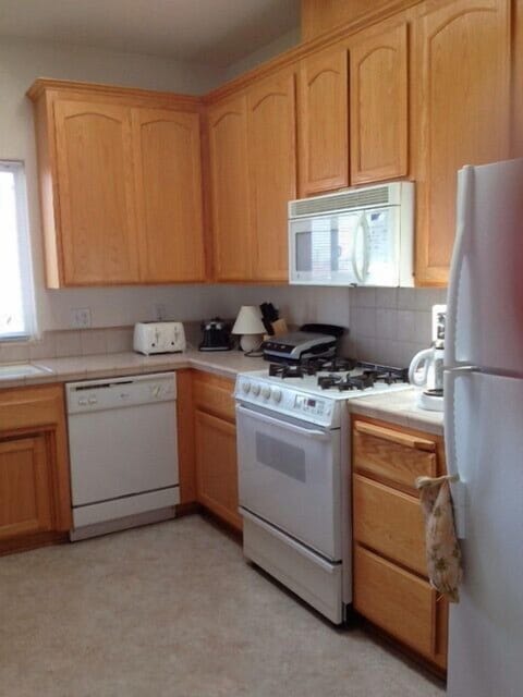 Kitchen is fully stocked to accommodate a large gathering.