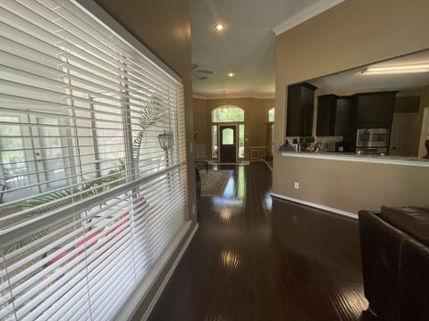 Lots of light with pool, forest, and meadow views