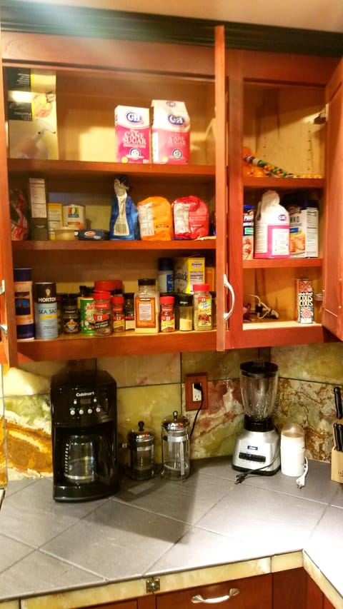 Stocked Pantry spices, flour, sugar ect. Blender Coffee maker, grinder, presses