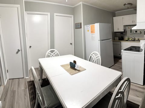 Dining/Kitchen Area - new paint and floor
