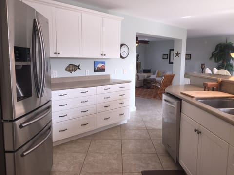 Kitchen with large refrigerator