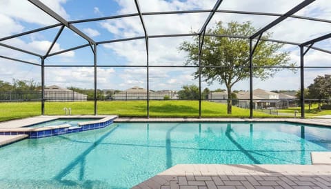 Relax in a private screened pool with no rear neighbors, just minutes from Disney.