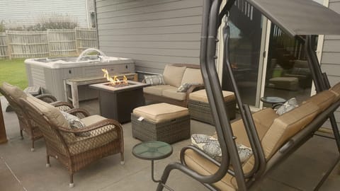 Fenced in yard with lots of space.  7 person hot tub with lots of furniture.