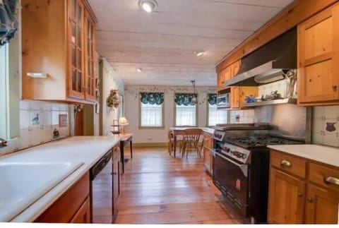 Open Kitchen with large gas cooking stove and griddle