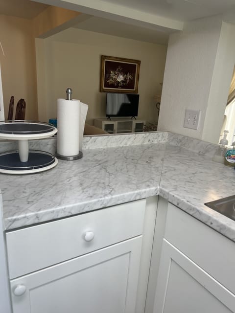 Kitchen looking through to dining and living room area
