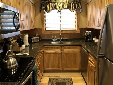 14 cup coffee pot, toaster oven, dishwasher and refrigerator. 