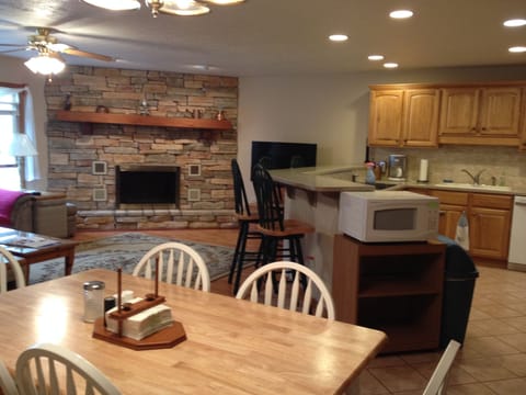 Dining area with seating for 6 at table & 4 at bar.  Maximum occupancy-6 guests