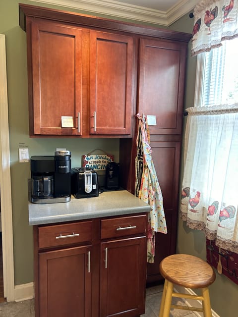 Dual Keurig drip coffee maker, toaster, can opener.