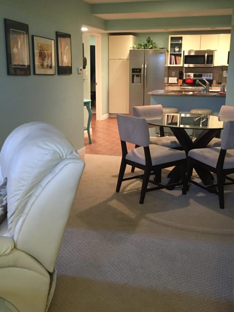 From the living room, you can see through the dining area into the kitchen.