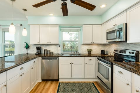 Fully stocked with all dishes/cookware and a complimentary coffee station.