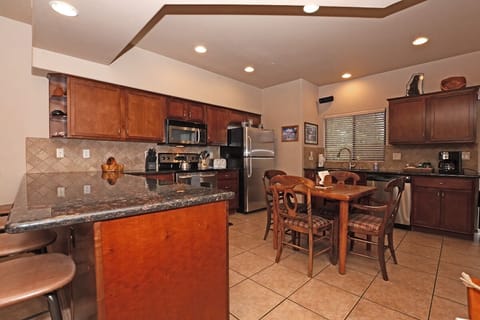 Kitchen with Stainless steel Appliances and Granite Counter tops