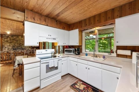 Kitchen with new appliances- oven, dishwasher, fridge & Chef's knives