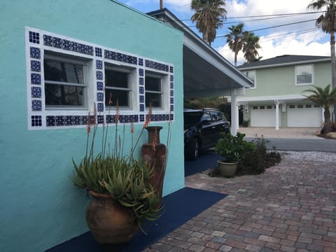 side of cottage showing kitchen windows.