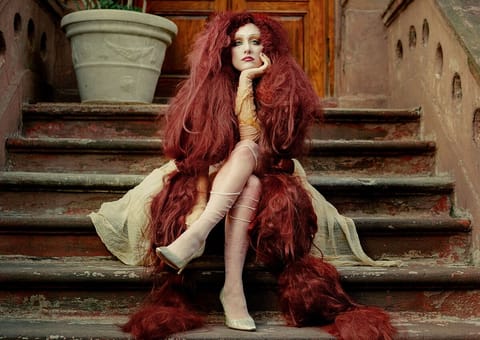 Chappel Roan posed for the Subway album cover on the Harlem Hideaway stoop.