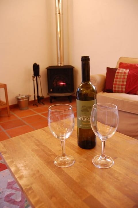 Enjoy a glass of wine in the warmth of the stove