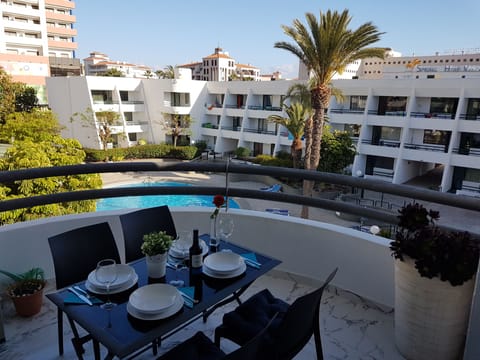 Here you can enjoy your meals with the view to the pool with a glass wine!