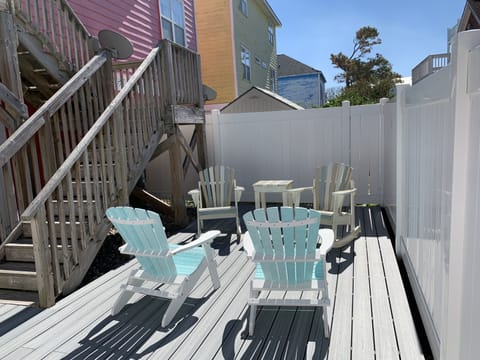 Decked Backyard with Table and Chairs