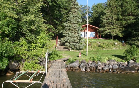 Welcome to Loon Nest- view of the cabin from the dock and shore station.