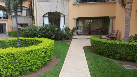 Walkout condo is steps from pool and beach