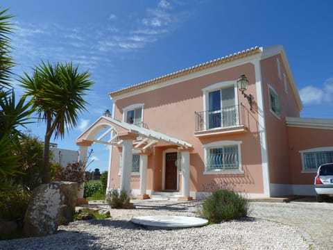 Front of Highview Villa with ample private parking space.