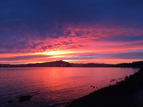Sunset from your own deck - view all three bridges and the pelicans fishing!