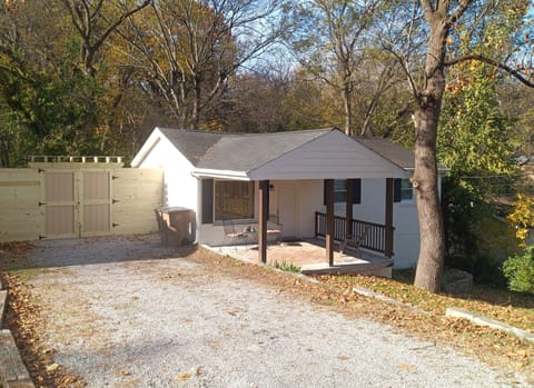 View from the driveway.  Plenty of room for your cars and shows new fence.