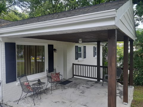 Great covered front porch for enjoying a nice beverage and hanging with friends.