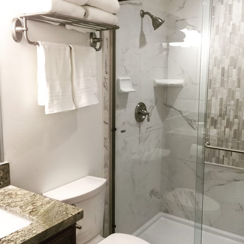 Gorgeous tile spa inspired shower.