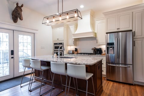 Kitchen #1- Gourmet Kitchen, Seating for 12-16, All Dish Ware, Glass Ware, Pots/Pans, Small Appliances Provided.  Keurig Duo and French Press Coffee Maker Available.