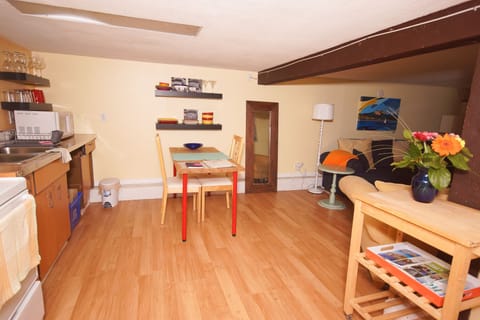 The kitchen and dining room are both stocked very well. 