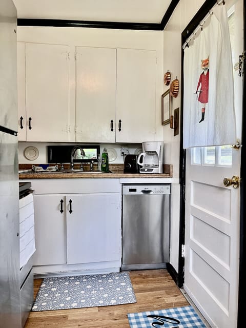 Full kitchen with side door access directly to park